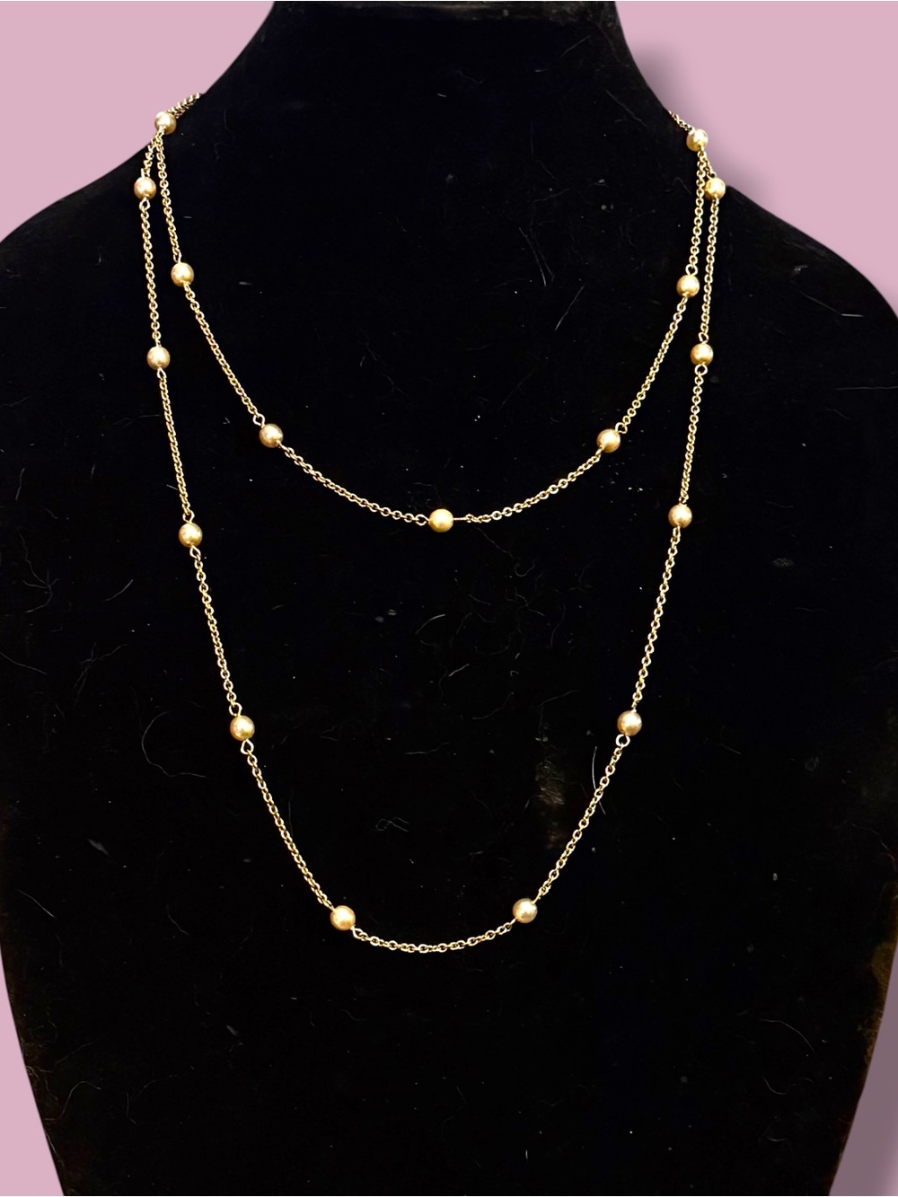 Nolan Miller gold tone station pearl necklace